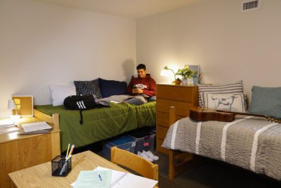 Student in his campus dorm