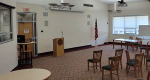 open reading room in library with tables and chairs