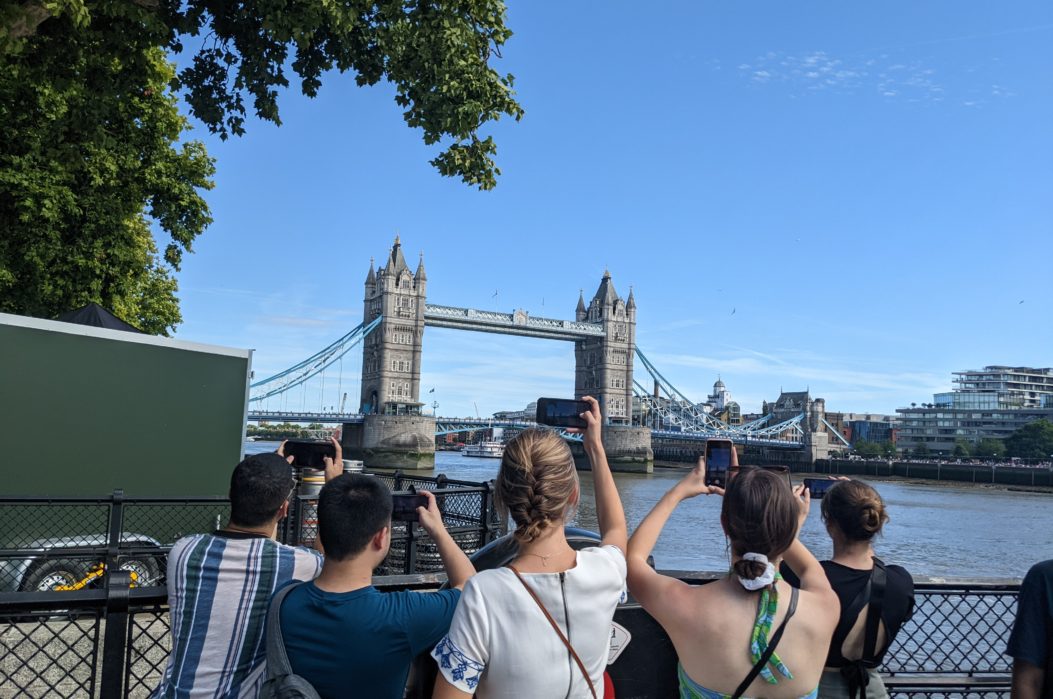 Students photographing London Bridge