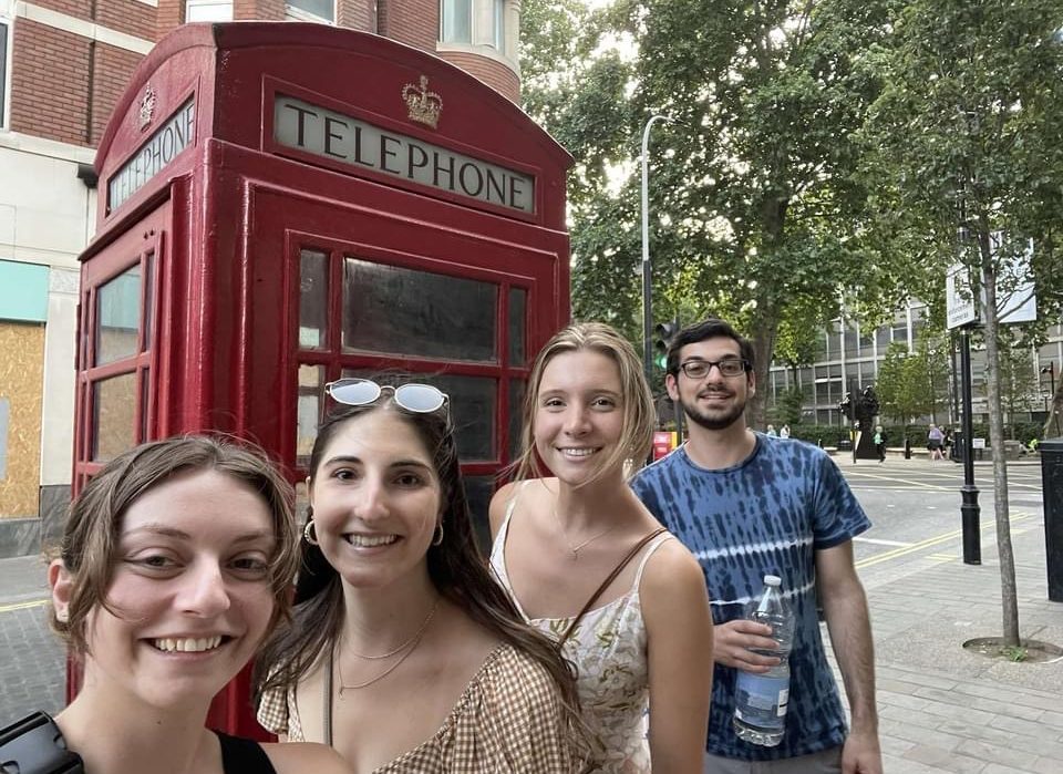 Students in front of phone booth
