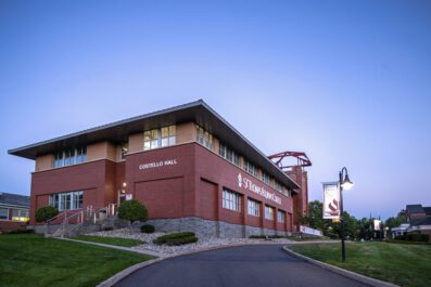 Costello Hall with blue sky in background